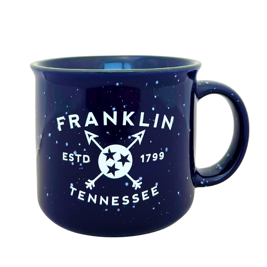 15oz speckled navy blue campfire mug says, "Franklin Tennessee EST 1799" in white with the Tennessee Tristar and crossed arrows.