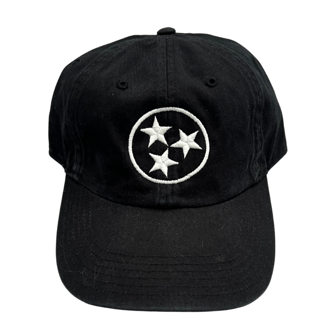 White stitched Tristar emblem on a black washed chino hat.