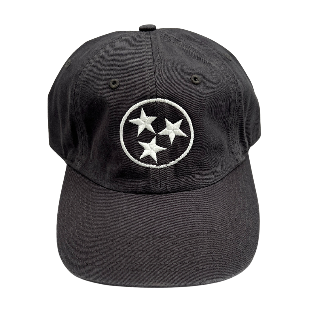 White stitched Tristar emblem on a slate gray washed chino hat.