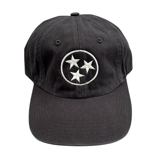White stitched Tristar emblem on a slate gray washed chino hat.